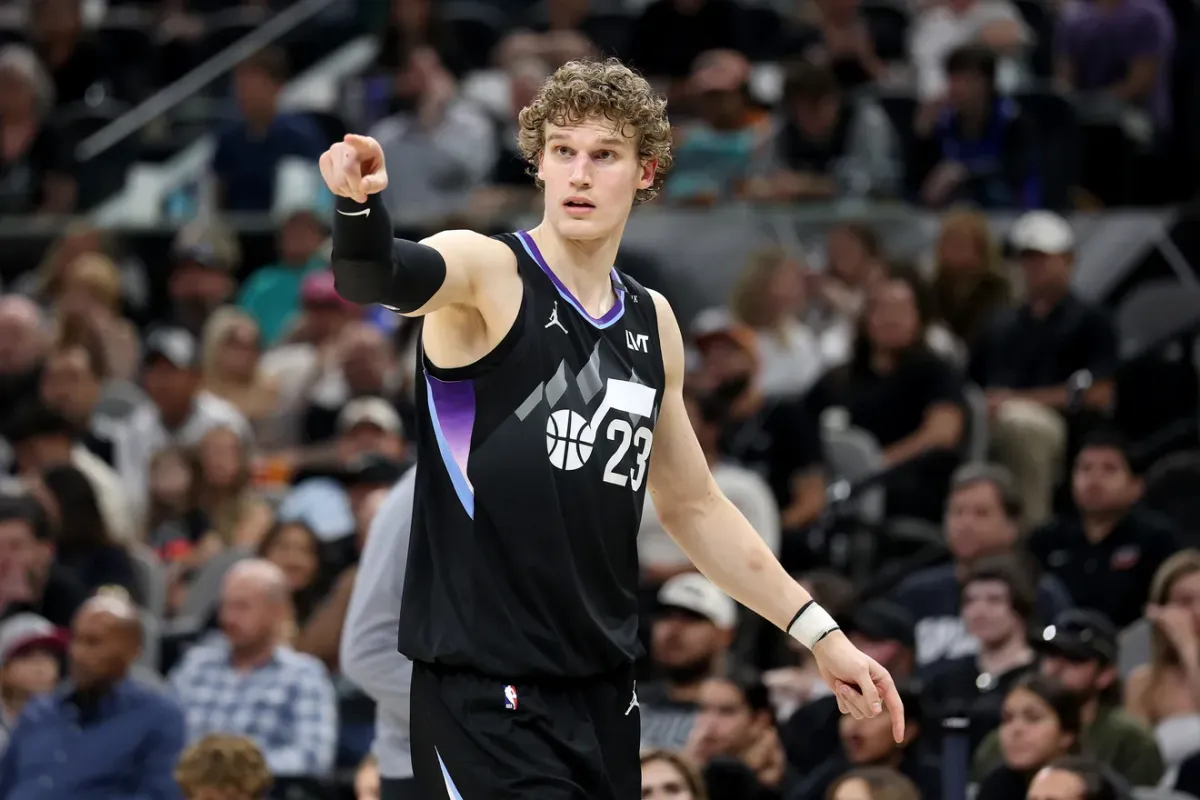 Utah Jazz forward Lauri Markkanen reacting during a game