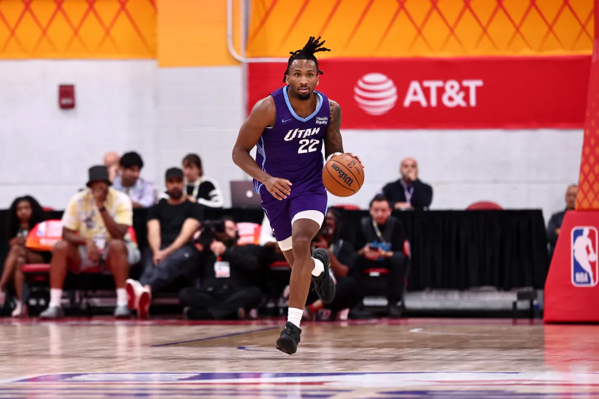 Utah Jazz rookie Darryn Peterson bringing the ball up the court at Summer League