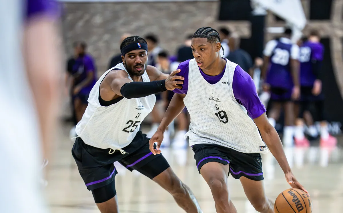 Utah Jazz players huddle at training camp